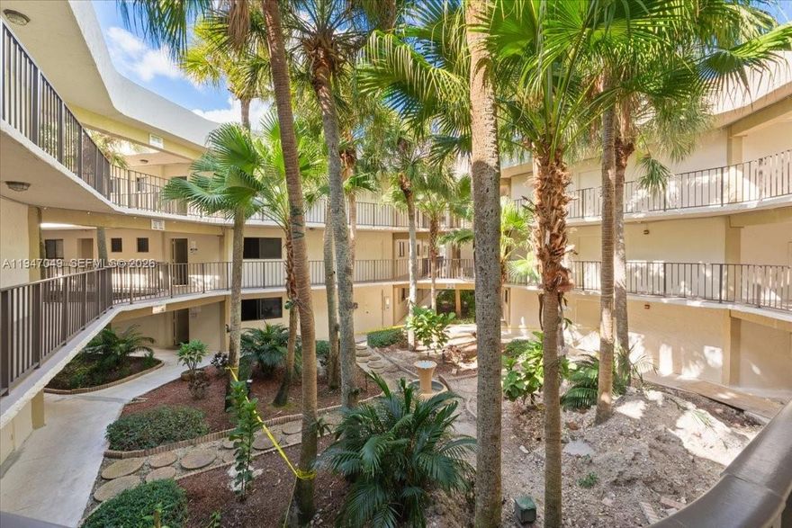 This updated 1-bedroom, 1.5-bath residence is located in the gated community of The Horizons and offers a bright, comfortable living space with laminate flooring throughout. The kitchen has been updated with stainless steel appliances and modern finishes, while both bathrooms have been refreshed. The spacious primary suite features ample closet space and a private bath. Enjoy tranquil garden views from the screened terrace and take advantage of community amenities including a pool, tennis courts, and fitness center. Conveniently situated near shopping, dining, and major highways, this home offers both convenience and ease of living.