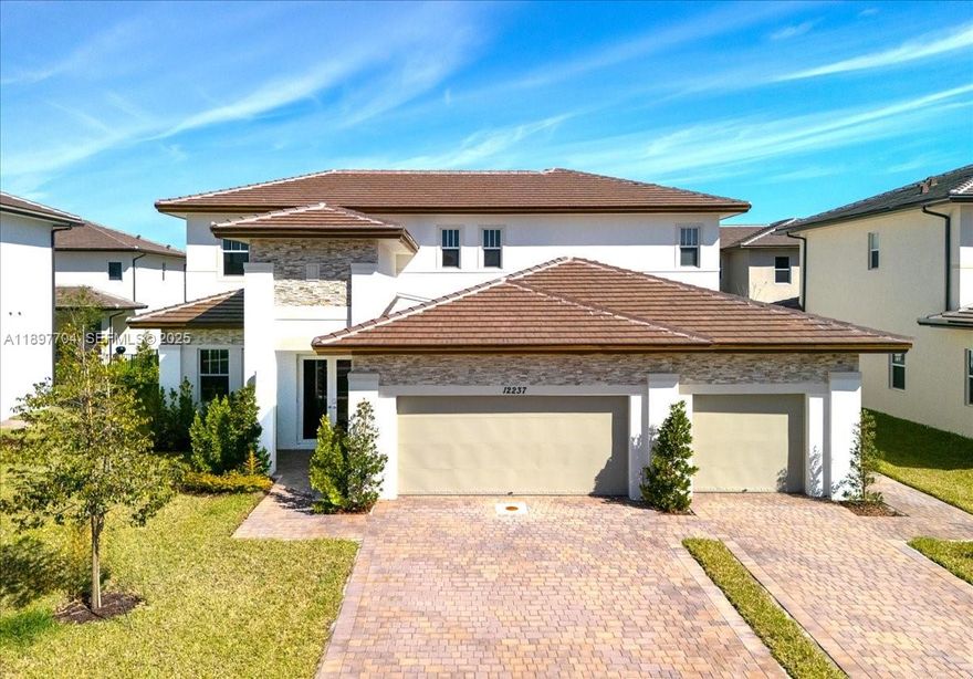 ONLY SECURITY AND FIRST MONTH NEEDED TO MOVE IN !Stunning new construction in Davie, FL. This 5-bedroom, 4.5-bath "Scottsdale" model spans 3,719 sq. ft. and showcases modern design, soaring ceilings, and expansive windows for natural light. The gourmet kitchen boasts premium appliances, while the master suite features a spa-inspired bath. A Next Gen suite offers private living space for guests or multi-generational needs. The owner has added a stylish finishing touch with vinyl flooring on the stairs and upstairs. With a 3-car garage and spacious backyard, this home is ideal for both comfort and entertaining. Conveniently located near top-rated schools, parks, and shopping. Schedule your private showing today!