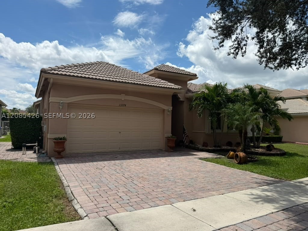 Photo of 13374 SW 30th St, Miramar, FL 33027 (MLS # A12085426)
