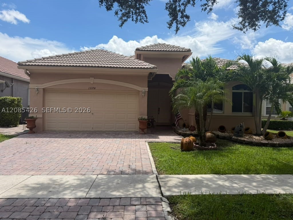 Photo of 13374 SW 30th St, Miramar, FL 33027 (MLS # A12085426)