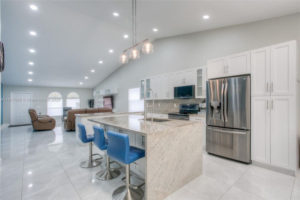 Photo of 10631 NW 32nd Ct, Coral Springs, FL 33065 (MLS # A11817089)