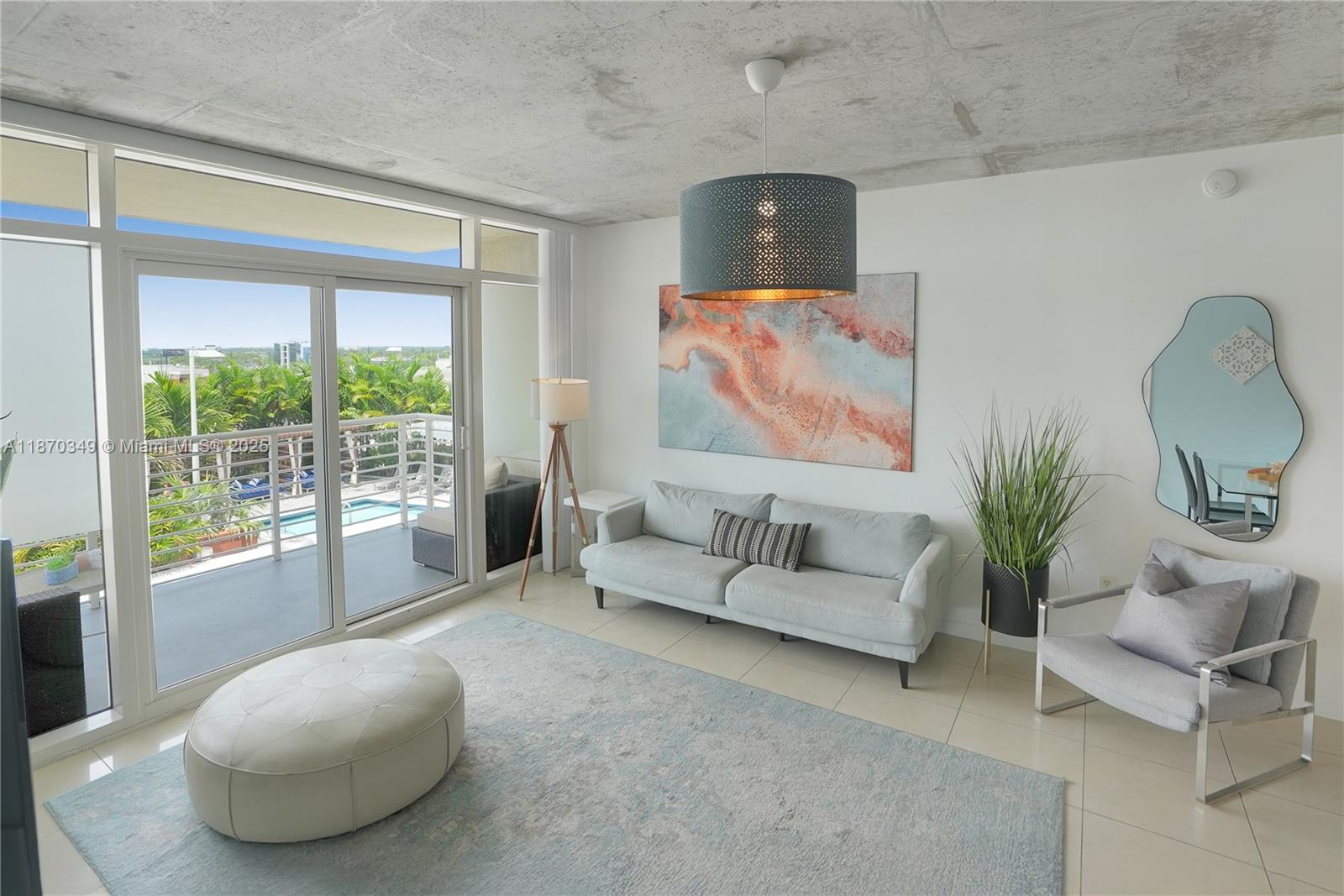 This condo comes fully furnished and is approved for short-term rentals. A rare two-bedroom, two-bath corner unit with a comfortable split bedroom layout. Features include open concept living, tall ceilings with large impact windows for natural light, plus a balcony to enjoy beautiful sunsets. Plenty of storage space, a private owner's closet, laundry inside the unit, and one assigned parking space. Midblock is a professionally managed building with full resort amenities, 24-hour front desk, and an on-site management team providing peace of mind for full-time residents and visitors alike. Nestled between Wynwood and the Design District, the Midtown neighborhood is pet friendly & walkable with endless restaurants, shops, and fitness options. This one checks all the boxes!