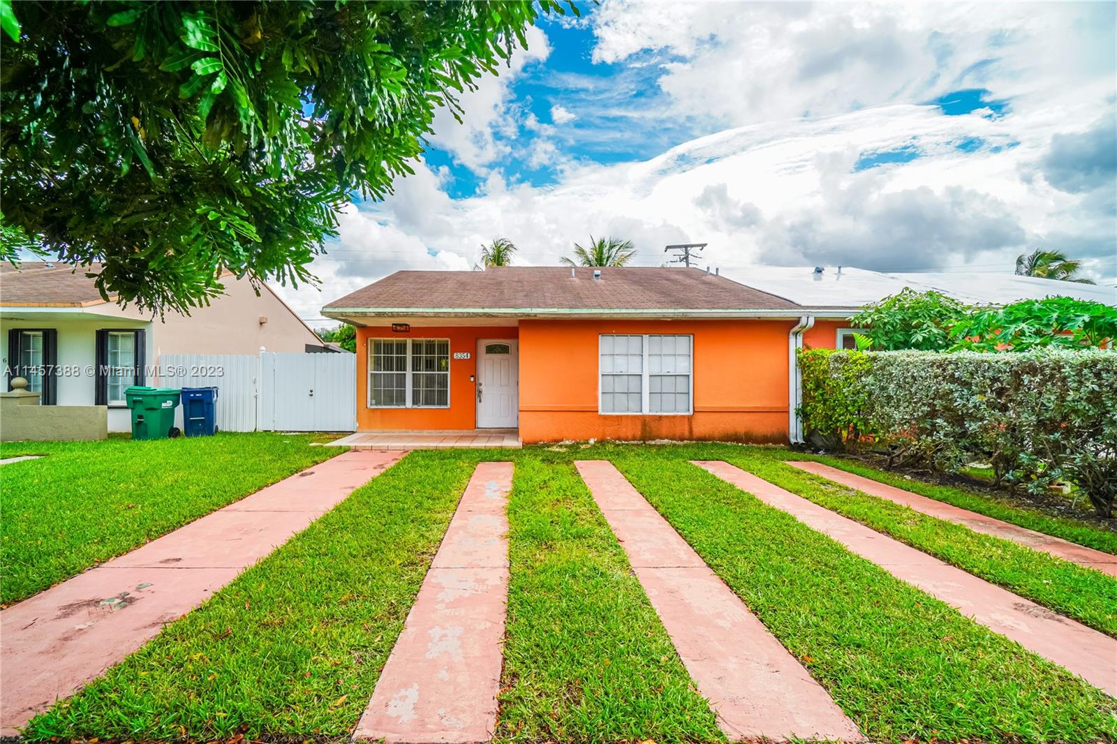 This Westchester twin home with no HOA has a ton of investment potential. Currently tenant occupied - month to month. This property is split into a main house 1 large bedroom and 1 full bathroom with an additional in laws quarter/efficiency in the back of the property that is set up as a 1/1 with a living room. This 1/1 was originally the second and third bedrooms with a bathroom. Can easily be opened back up to a full 3/2 twin home. This home is partially remodeled in the main house, completed 4-5 years ago. Impact windows/doors installed on side of property and back of home, 2 front windows are not impact but have storm protection. Shed included in sale.