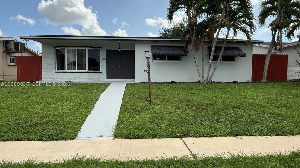 Photo of 2211 N 54th Ave, Hollywood, FL 33021 (MLS # A12089836)