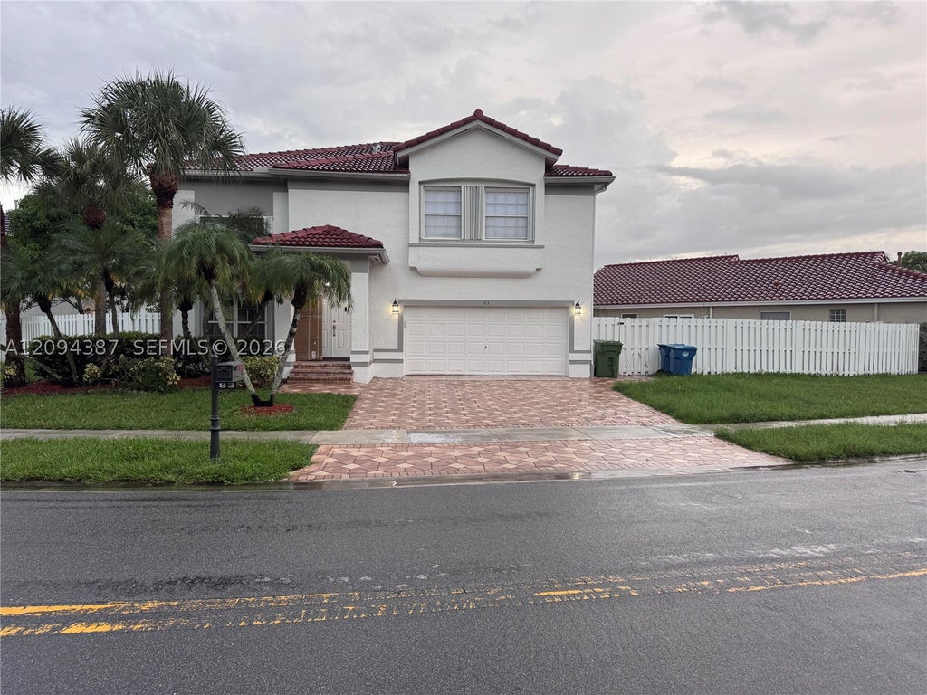 Photo of 83 Gables Blvd, Weston, FL 33326 (MLS # A12094387)