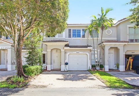 Photo of 5657 NW 113th Ave, Doral, FL 33178 (MLS # A12095233)