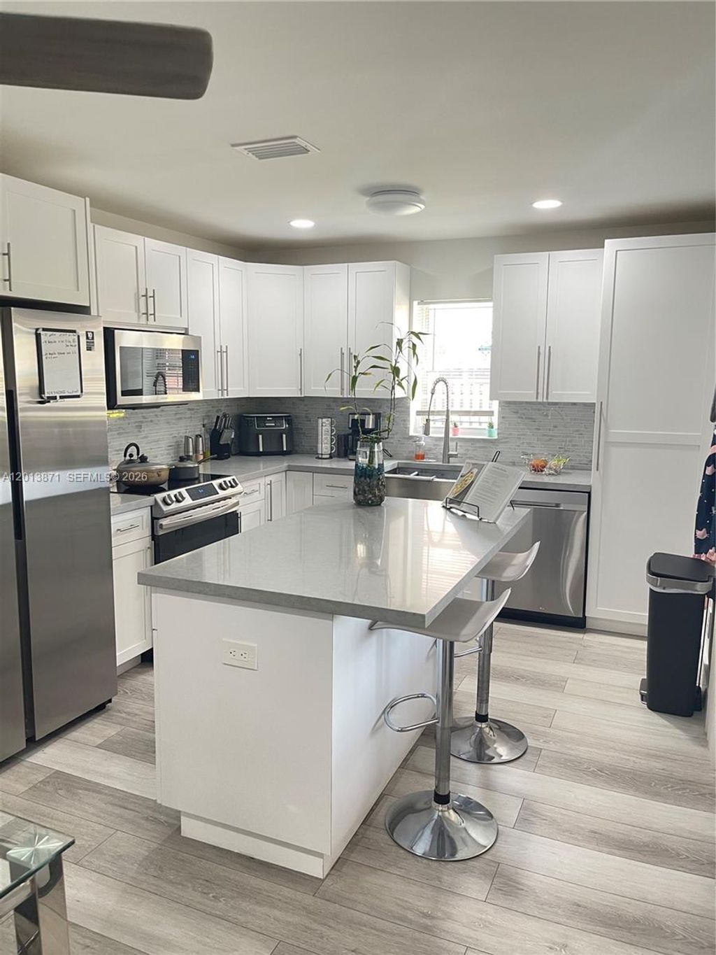 Photo of 2665 NW 99th Ave #2665, Coral Springs, FL 33065 (MLS # A12013871)