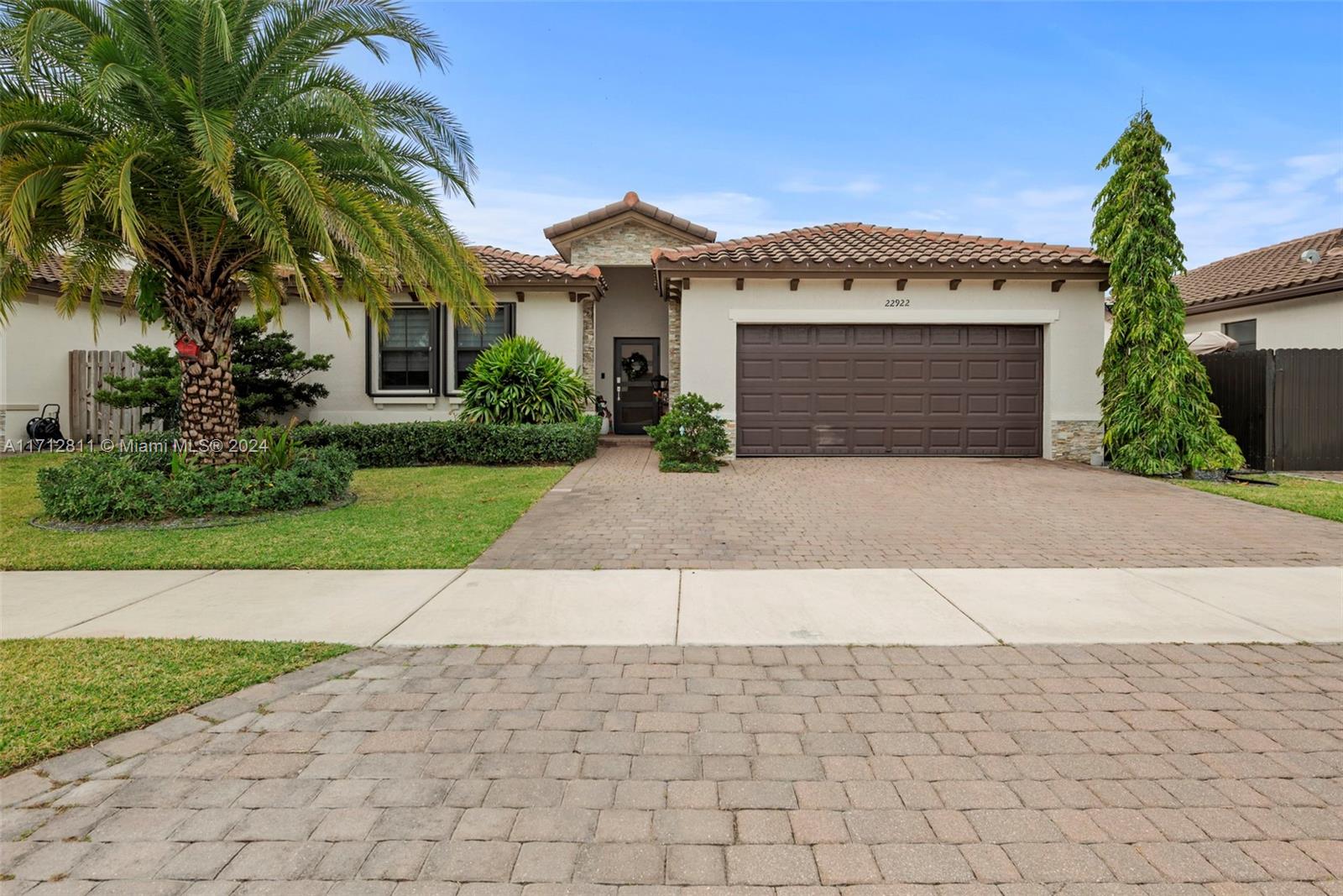 Step into this stunning, modern 4-bedroom, 2-bathroom home built in 2020, perfectly situated in a prime location! This stunning property features a sparkling pool and a stylish pergola with a fully equipped outdoor kitchen and electrical connections, perfect for entertaining & enjoying serene evenings outdoors. Recent upgrades include an expanded driveway, lush landscaping, and a modern sprinkler system to keep your surroundings looking immaculate. Inside, spacious living areas and thoughtful enhancements create a blend of comfort and style, offering versatility and extra living space. This is truly a must-see property that combines convenience and elegance.