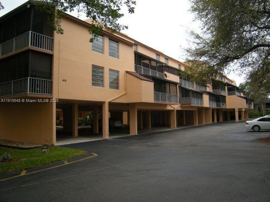 400 Commodore Dr, Apt 108 is a charming 2-bedroom, 2-bathroom condo nestled in the gated Lago West community in Plantation. Inside, you’ll find a mix of Berber Carpet and Tile flooring, a functional layout with split bedrooms, and a practical in-unit washer/dryer.  Brand new Hurricane resistant door and Windows. The screened patio offers a peaceful retreat with garden views. The screened patio offers a peaceful retreat. Within a community rich in amenities — including a clubhouse, fitness center, pool, and tennis courts — all secured behind a gated entrance.  Its central location provides very easy access to major highways, shopping options like Sawgrass Mall, and top-rated schools, making it both comfortable and convenient. Pet-friendly community.