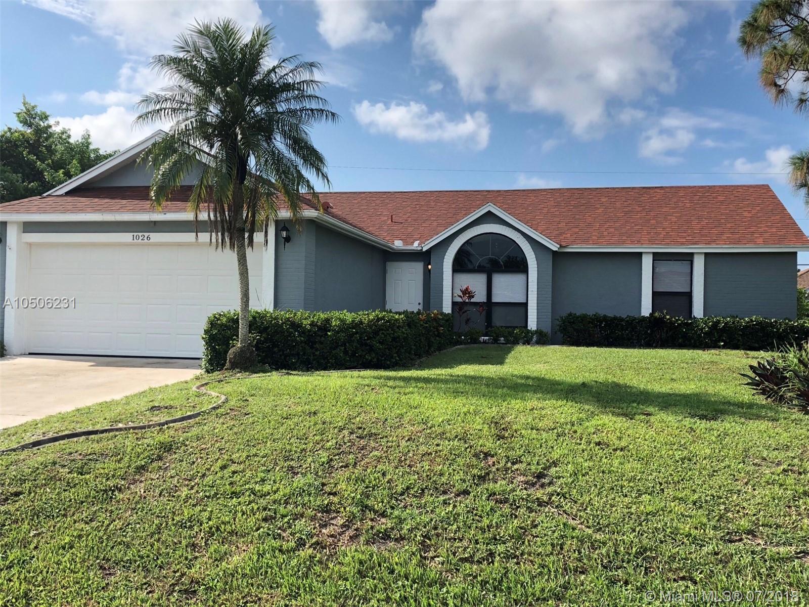 This 3 bedroom 2 bath, 1,700 sf home is located in Port St Lucie, FL. This home features beautiful vinyl and plush carpeted floors, an updated kitchen with all white appliances, spacious dining area and car garage. Private back patio with fully fenced in yard, great for pets and outdoor entertaining.