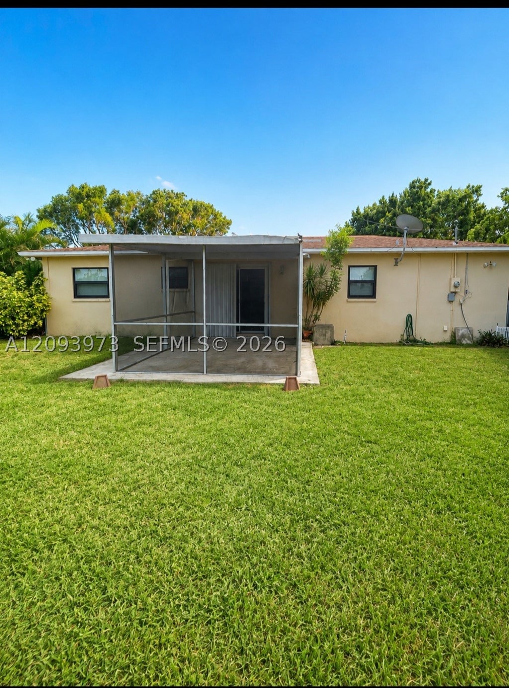 Photo of 539 Sabal Palm Dr, Lake Park, FL 33403 (MLS # A12093973)