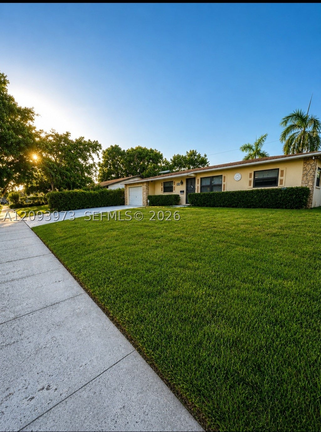 Photo of 539 Sabal Palm Dr, Lake Park, FL 33403 (MLS # A12093973)