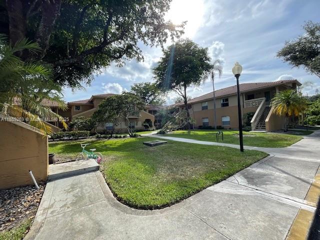 One-bedroom, one-bath villa featuring a screened porch accessible from both the living room and bedroom. Water and trash service included..