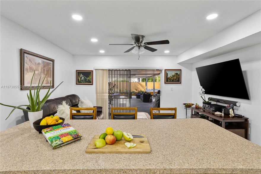 Beautiful single-family home with NO HOA in the heart of Westchester. Versatile split 4/3 layout across two stories: the main level offers 2 bedrooms/2 baths, including a primary suite with a spacious en-suite bath, a flex room ideal for office/playroom/storage, and interior laundry. Upstairs features 2 oversized bedrooms and 1 full bath. Open living areas flow to a backyard patio perfect for gatherings. NEW METAL ROOF 2025, NEW Hight Impact Door & windows, Front-door parking with private driveway and side space to store a jet ski or trailer. Quiet, central location minutes to Palmetto Expressway, shopping, supermarkets, malls, and A-rated schools. Easy to show.