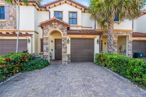 Photo of 6973 Broadland Way, Coconut Creek, FL 33073 (MLS # A11882659)