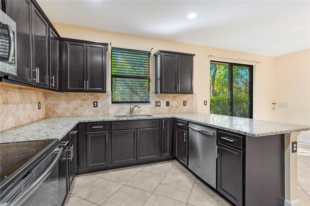 Photo of 6973 Broadland Way, Coconut Creek, FL 33073 (MLS # A11882659)