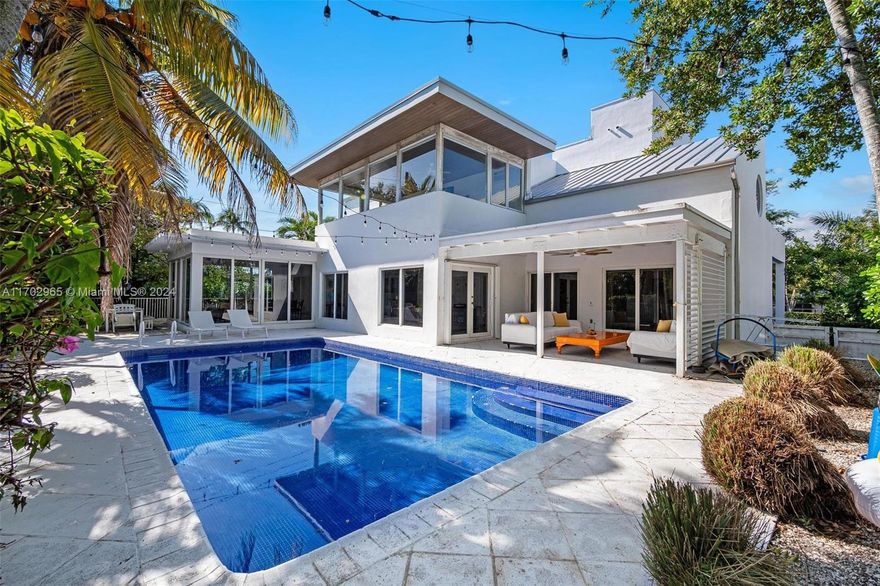 Enjoy this stunning family home in the heart of prestigious Key Biscayne! Ideally situated just steps from the PK-8 school and within walking distance to the supermarket, shops, Village Green Park, and the Community Center.
This spacious residence boasts 4 en-suite bedrooms, a maid’s quarters, two family rooms, and an atelier, offering ample space for comfort and creativity. The beautifully renovated pool area and hurricane-impact windows provide both luxury and peace of mind.
Perfect for a large family that loves to entertain and embrace the best of island living.
The house is approximately 4,600 square feet, as reported by the owner.