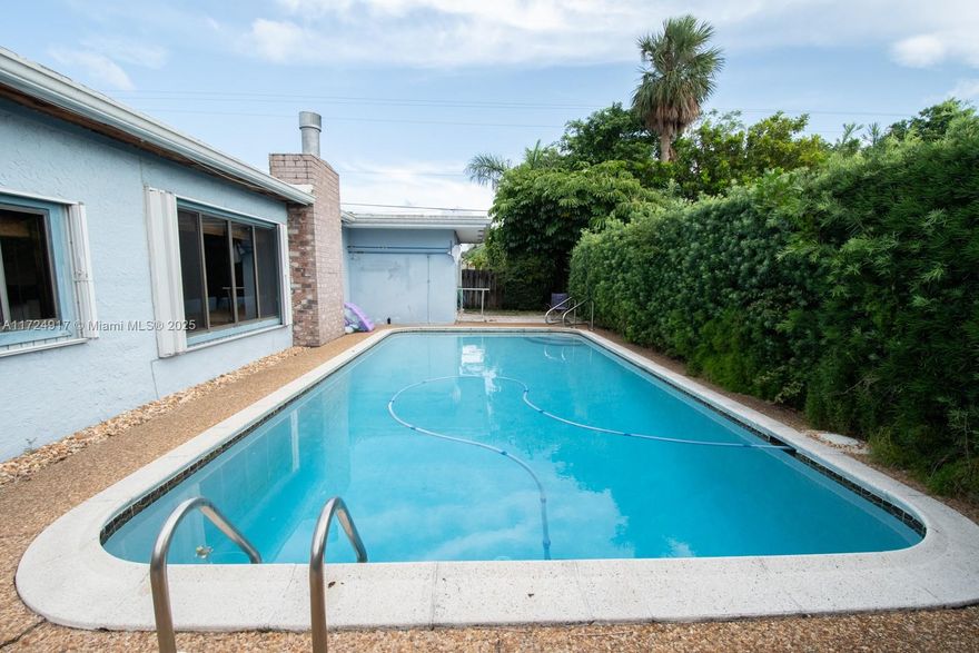 This 3/2 home is nestled in a quiet neighborhood w/in walking distance to parks. It has a metal roof, impact windows, a heated, recently resurfaced large lap pool, solid wood bamboo floors in 2 rooms, Spanish tile living area, great room & master bedroom, wood plantation shutters on front windows, a working fireplace, a 2 car garage & plenty of parking. Oakland Park is close to Ft Laud, Pompano, InterMiami soccer stadium, the beach, shopping, highways, FLL airport & more. This house is perfect to work, live and play! The City itself is undergoing a transformation, becoming a singular destination in Broward. Also a $40 million bond project has updated most of the public infrastructure. Come and make this comfy, updated house your new home and enjoy all the perks of living in Oakland Park!
