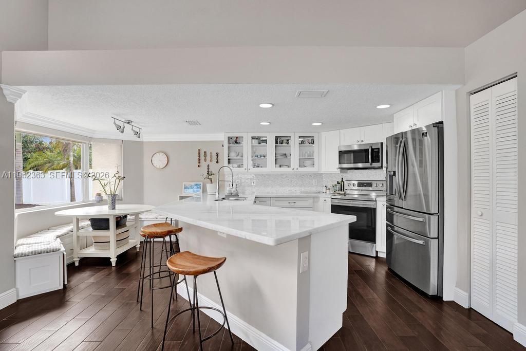 Photo of 5720 NW 62nd Mnr, Parkland, FL 33067 (MLS # A11962363)