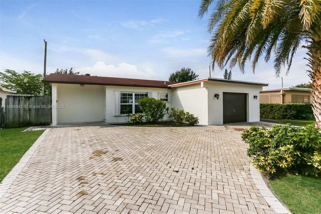 Photo of 7730 NW 39th St, Hollywood, FL 33024 (MLS # A11896942)