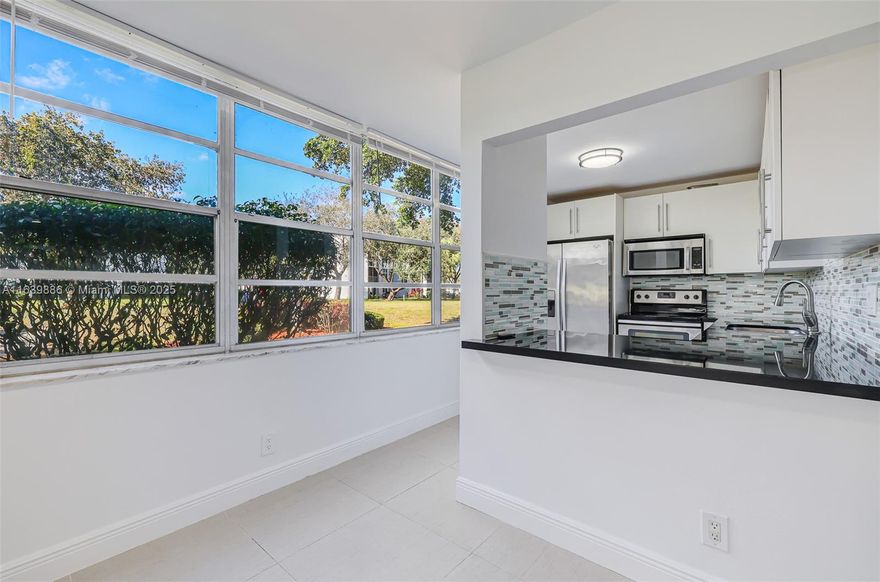 We are excited to announce the availability of a ground floor corner 2-bedroom condo located in the prestigious Evergreen Complex, offering stunning views of the 9th hole on the Pine Island Ridge Golf Course. Community has fabulous clubhouse and restaurant included in HOA fees, bike and walking trails