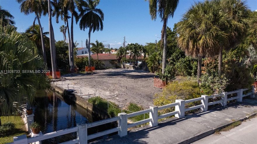 Builder Ready Residential vacant lot. Potential for one or two story custom home, plus pool. Large lot with beautiful view, canal frontage, lush landscaping. Central location in the heart of Miami. Minutes from Brickell, Airport, Hospitals.