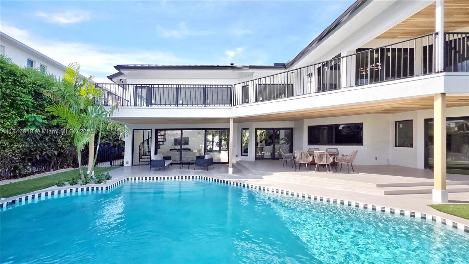 Located in Boca Grove, this charming remodel features a beautiful 16th-hole golf course and lake view along with a new metal roof, impact doors, windows, kosher kitchen and a short distance to several worship centers. With 5 bedrooms and 4.5 baths, this home is ideal for those looking for comfort and space. The Boca Grove community features an 18-hole golf course, and a full-service sports and wellness center with a resort-style pool. For those with an active lifestyle are 12 clay courts featuring one imported red clay, and 11 Har-Trus, plus many more for pickle and paddleball. Come enjoy the lifestyle this community has to offer.