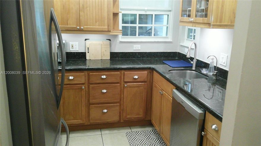 Updated villa in players place,All floors updated  with vinyl flooring newer kitchen,washer dryer in unit,has loft that can be converted to third.all bathrooms updated and in great condition.appliances are newer..