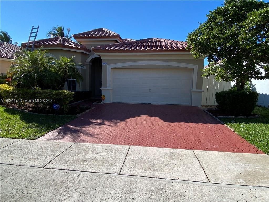 Photo of 4980 SW 134th Ave, Miramar, FL 33027 (MLS # A11820474)