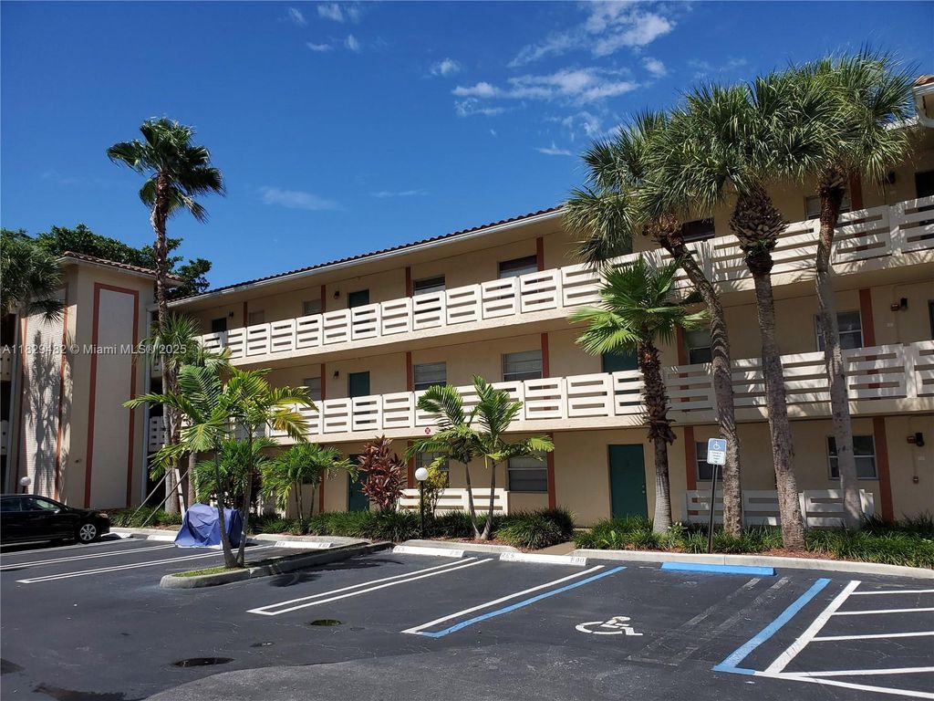 Photo of 3212 NW 102nd Ter #203-F, Coral Springs, FL 33065 (MLS # A11829482)