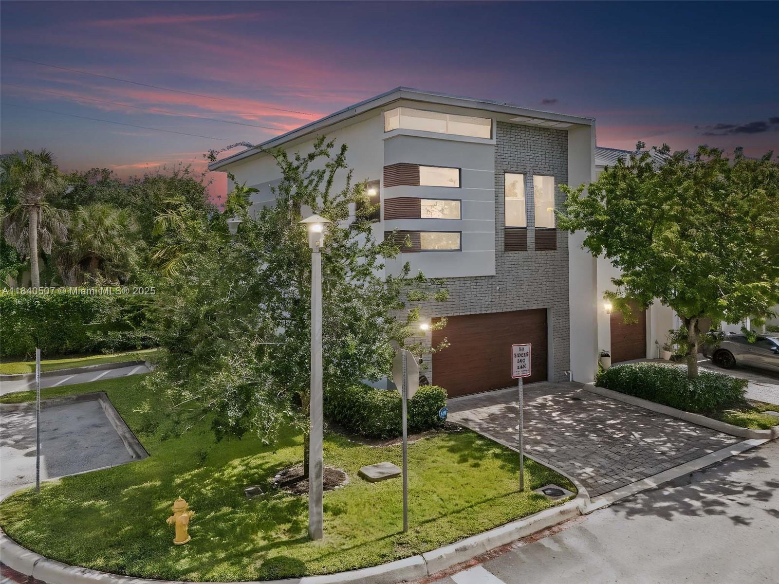 Sleek, stylish, and sun-drenched—this corner townhome in Plantation delivers 1,672 sq ft under air and nearly 2,000 sq ft including a 2-car garage. Built in 2018 with modern flair, it features soaring ceilings, designer finishes, and a show-stopping kitchen with quartz counters and black stainless appliances. Upstairs, the primary suite stuns with dual walk-ins, a spa-inspired bath, and private balcony. Loft/office adds flexibility. Prime location near top schools, parks, and everything you need. This is the lifestyle upgrade you’ve been waiting for.