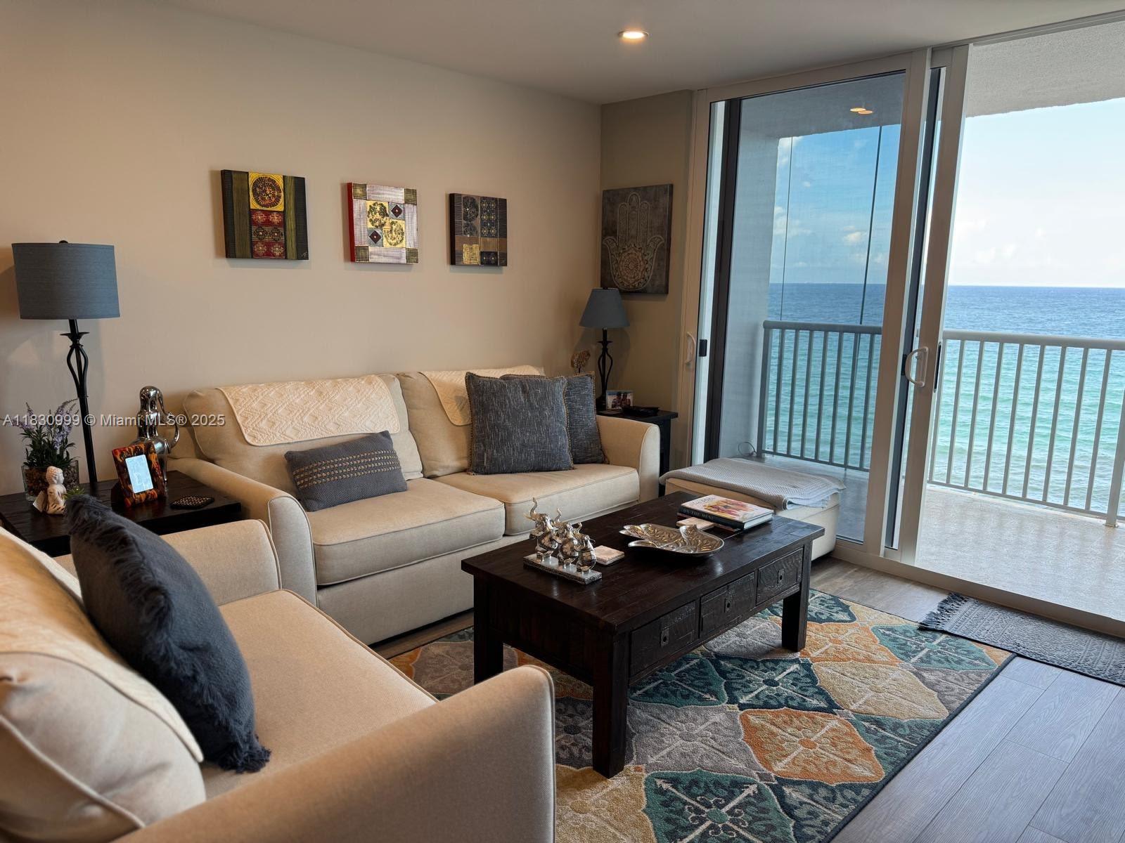 Located on the pristine Hollywood Beach and Hollywood Boardwalk, this beautifully fully remodeled 1-bedroom, 1.5-bath condominium is located in the desirable Edgewater Beach Towers in Hollywood. The bright and spacious unit features a modern kitchen with marble countertops and stainless steel appliances. It includes vynil waterproof laminate flooring throughout and updated bathrooms with contemporary finishes. Enjoy full ocean views from the private balcony and benefit from ample closet space and a den. The well-maintained building offers amenities, including a pool, gym, and direct beach access. This unit is move-in ready, making it ideal for year-round living or as a vacation getaway.