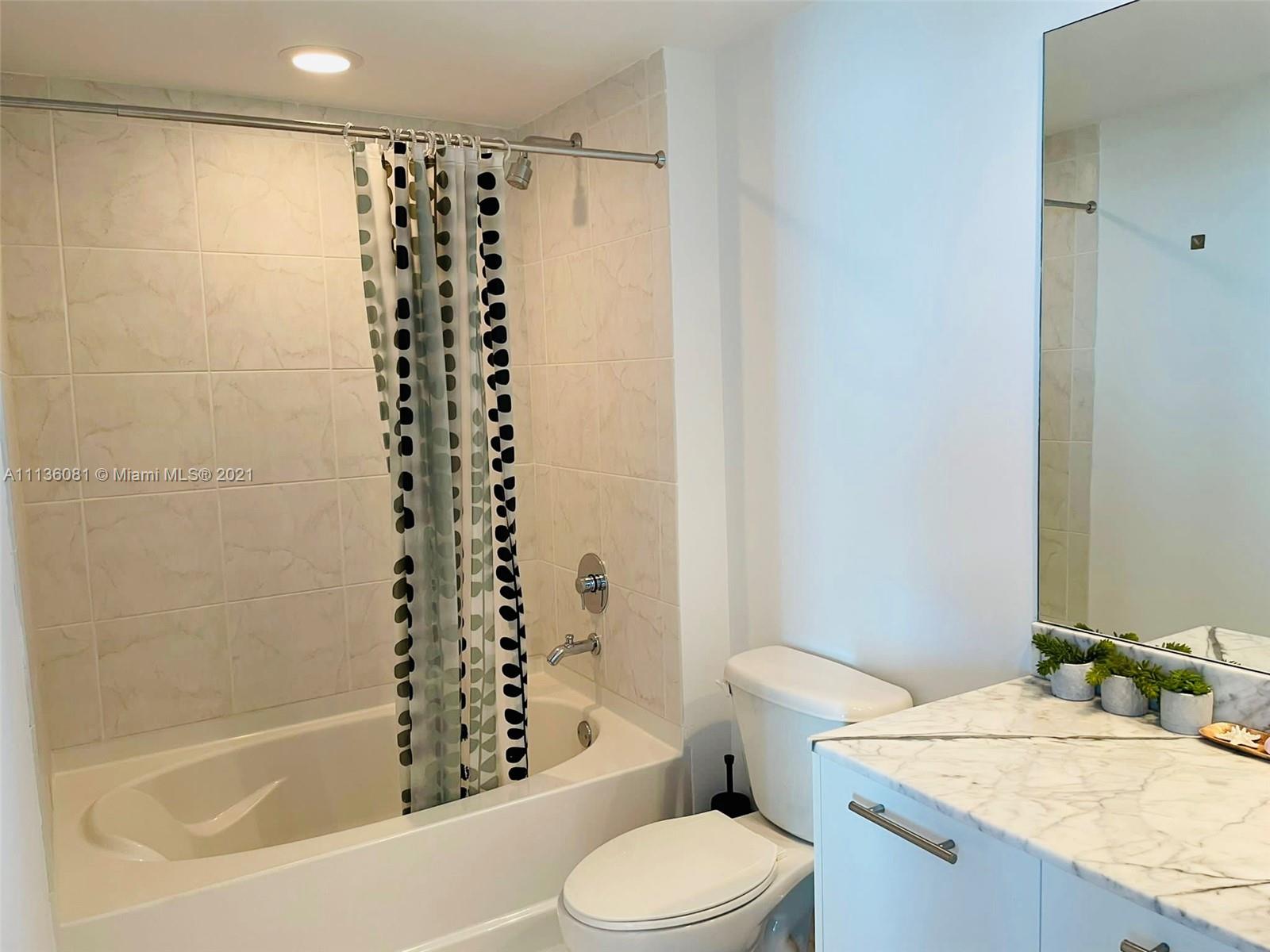 THE PLAZA 901 BRICKELL CO - Residential Lease