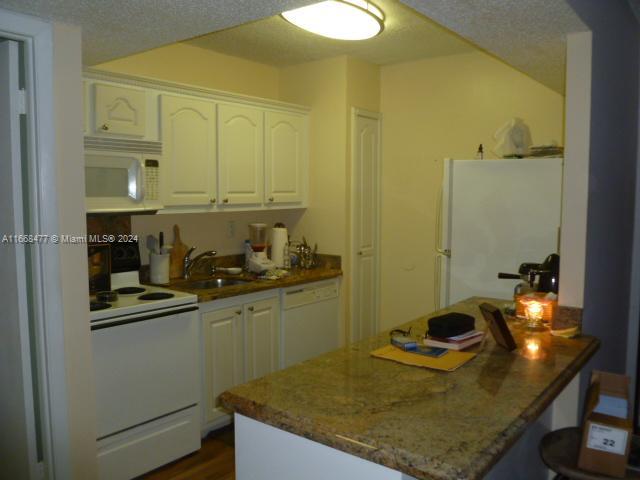 2/1 apartment in a very desirable area near Dolphin Mall and major highways like Turnpike and 836. The unit is located on the first floor, has a big patio and washer and dryer inside the unit.  Gated community with pool. You won't find a property for sell with such amazing conditions in this area. Serious inquires only, this won't last.