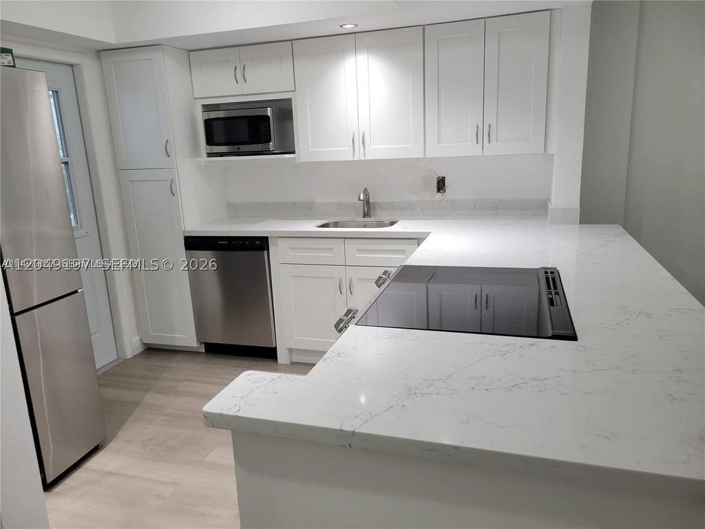 Photo of 1333 E Hallandale Beach Blvd #329, Hallandale Beach, FL 33009 (MLS # A12049197)