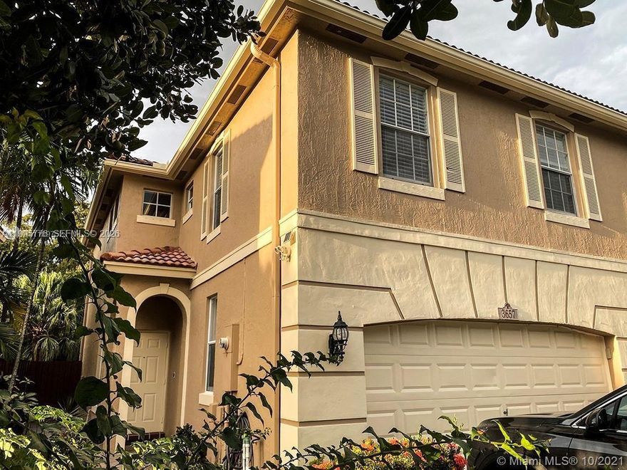 Beautiful 3/2/1 townhome located at Banyan Trails. Features a kitchen with white, modern cabinets, and stainless steel slate appliances. Neutral color walls, Ceramic Tile thru out ground floor and laminate floor upstairs. Large master bedroom with walk in closet. Master bathroom features dual sinks, shower and roman tub, 04 Parking spaces, the garage has a switch for electric car charging, automatic garage door opened. Private back yard with screened in patio perfect for relaxing or entertaining family. Located near the excellent schools and Promenade, shopping, highways. Front loader washer/dryer. Community offers 2 pools, clubhouse, kids area, and fitness center. The Community is just 2 minutes from Sabal Pines Park which has Tennis, Baseball and Soccer fields.