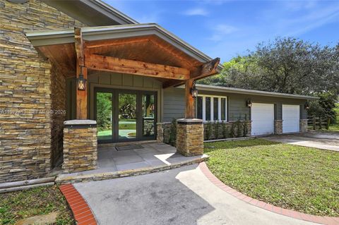 Photo of 400 Farmington Dr, Plantation, FL 33317 (MLS # A11972413)