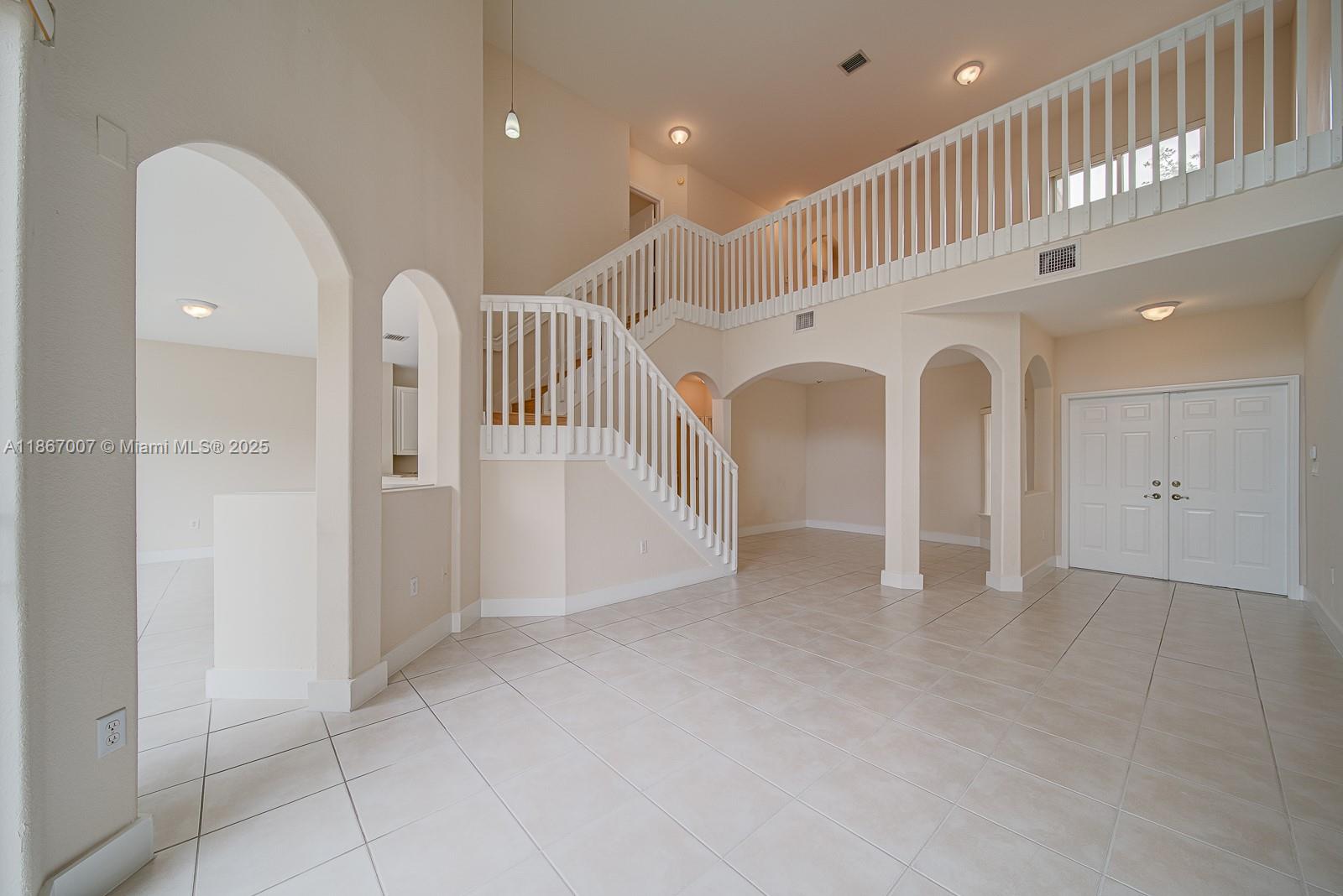 Spacious 3-bed, 2.5-bath townhome in the Las Cascadas - Doral. Open-concept living with double-height cielings, open kitchen, and tons of natural light. Features include a private patio, 2-car garage, and access to community amenities like pool and clubhouse. Located near top-rated schools, shopping, dining, and major highways. Perfect for families or professionals seeking comfort and convenience. Easy to show!