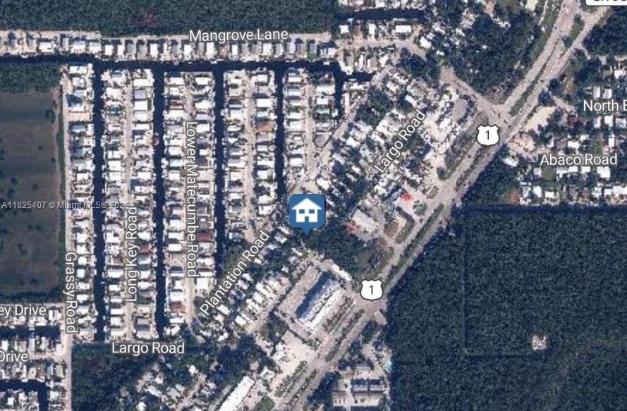 Prime opportunity to own in desirable Lake Surprise Estates in Key Largo! This residential lot features an older trailer currently on site—ideal for clearing and building your dream home in paradise. Convenient location just minutes from the mainland and a short ride to local marinas, dining, and shopping. Some building restrictions apply regarding home size—buyer must verify with Monroe County Building Department. Whether you're looking to invest or build a Florida Keys retreat, this lot offers great potential!