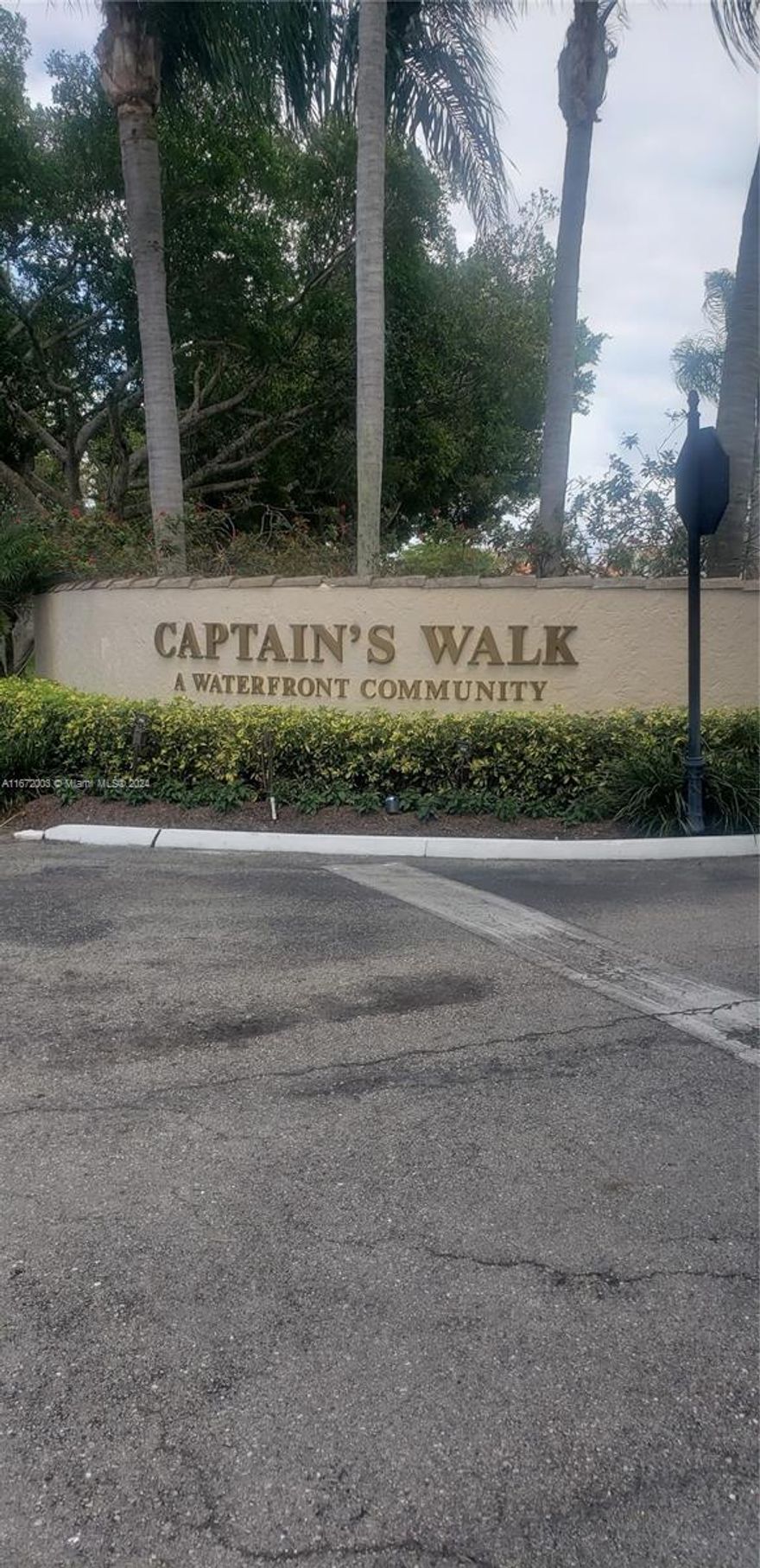 Paradise found! DOCK available!! No fixed bridges and ocean access.  Large, updated, bright & furnished 2/2.5 in Captain's Walk, a private community located within the guard gated Pelican Harbor with a dock. Apartment backs up to the C-15 canal and has expansive water views from 2 balconies. Community has tennis courts/pickleball courts, 2 heated pools, exercise room, tiki hut, party room and barbeque areas. Carport for 1 car, another car can park uncovered & plenty of guest parking. Basic Cable, internet and water included. Washer & dryer in the unit. Second bedroom has 2 full sized daybeds with trundles for additional sleeping areas, 2 closets and own bathroom. Available for annual rental, $5500/month. Seasonal $7000 without dock. Dock for a large boat IS available.