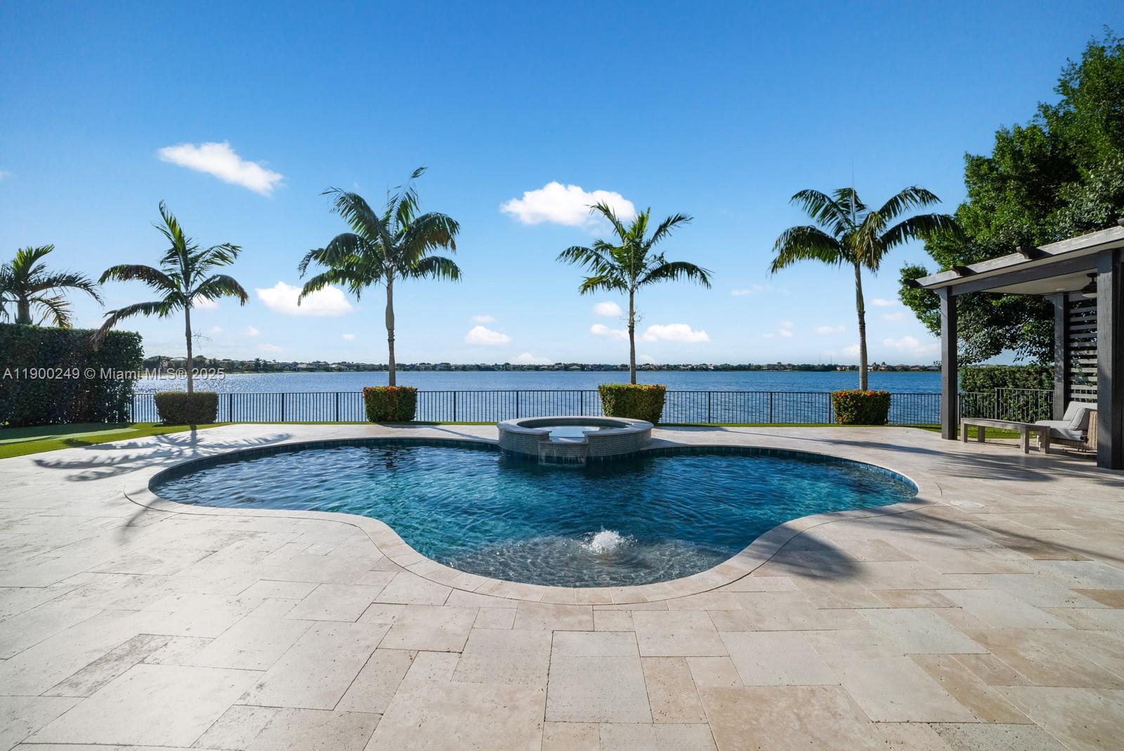 Absolutely stunning estate in Watercrest! This nearly 5,300 sq ft home offers 6 bedrooms, 5.5 baths, plus the option for a 7th bedroom or office. Features include a designer kitchen with Wolf & Sub-Zero appliances, waterfall island, and custom finishes throughout. Enjoy luxury living with a golf simulator, putting green, surround sound, and an expansive custom closet the size of a bedroom. The backyard oasis boasts a saltwater pool, pergola, and lush landscaping—perfect for entertaining. Impeccably maintained and move-in ready, this home defines modern Parkland luxury.