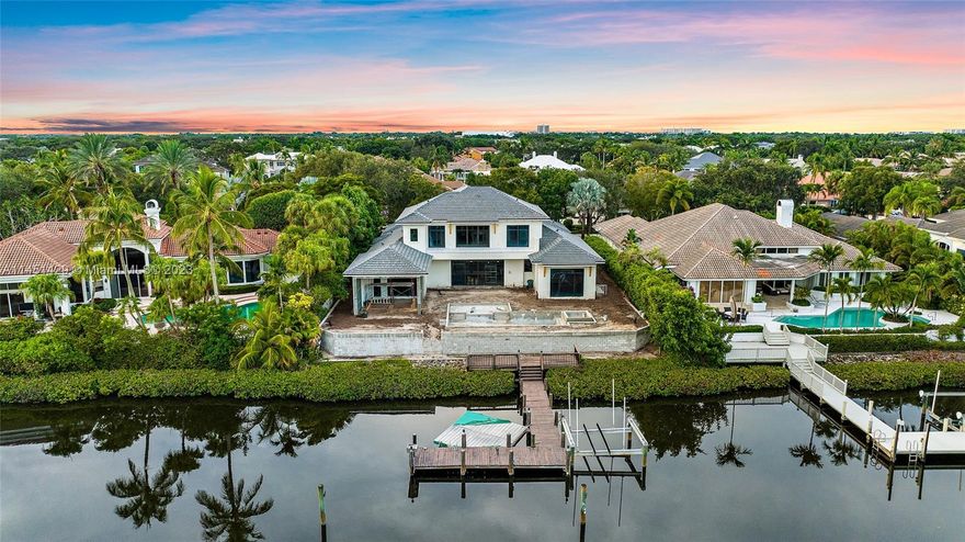 SEASON READY WATERFRONT ESTATE HOME - This waterfront estate home will be ready in 6 short weeks. 5 bedrooms, 6.2 baths with an open kitchen to great room, club room, 2nd floor family/loft area, primary bedroom 1st floor. Chef's kitchen with custom cabinets and countertops, island food prep station, counter seating, breakfast dining that all over look the resort style pool, loggia, summer kitchen and waterways. Relax and enjoy countless hours poolside or under the loggia. Primary Suite boasts 2 full baths, 2 luxurious walk-in closets, Zen sitting area with access to the rear yard and pool. 1 additional guest suite on the 1st floor and 3 more suites on 2nd floor all richly appointed and sized. Membership will have new pricing November 1, 2023. Full Golf will be $300,000