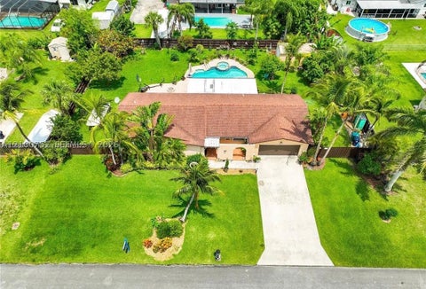 Photo of 28125 SW 158th Pl, Homestead, FL 33033 (MLS # A12100752)