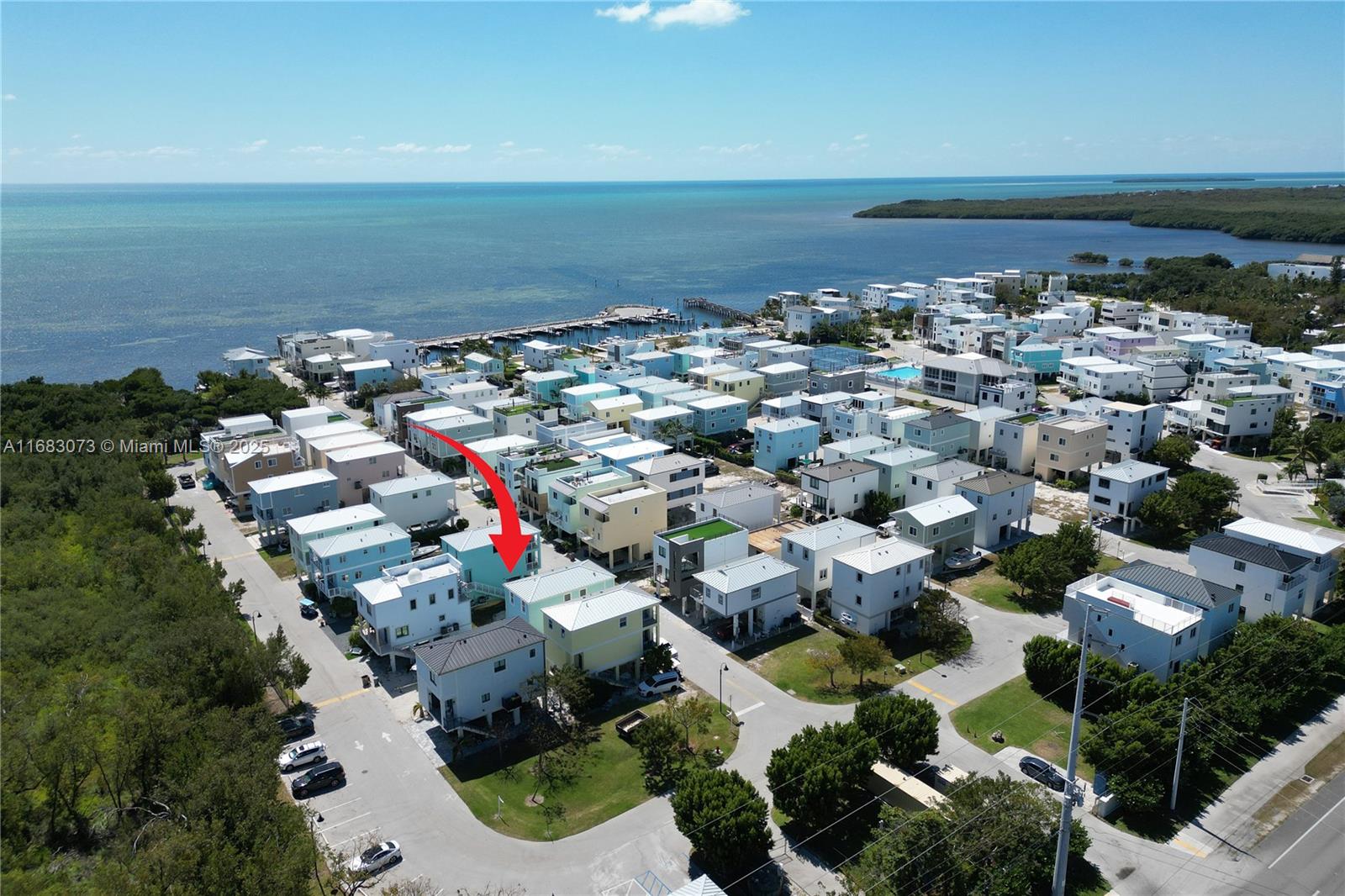 ROGO EXEMPT VACANT LOT- MONROE COUNTY APPROVED PLANS MAY BE PROVIDED BY OWNER UPON REQUEST- Discover the perfect opportunity to build your dream getaway in the beautiful Key Largo Ocean Resort. This vacant lot is situated in a prime location, surrounded by stunning natural beauty and just moments away from the ocean. It is a family-friendly environment, golf cart community that offers a large clubhouse, pool, marina, basketball courts, playground, tennis, and pickle ball. Enjoy easy access to boating, fishing, and other water activities.