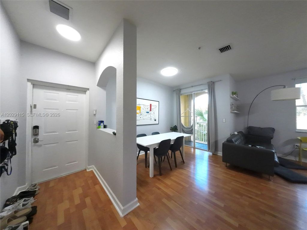 Photo of 130 Jacaranda Country Club Dr #203, Plantation, FL 33324 (MLS # A12029115)