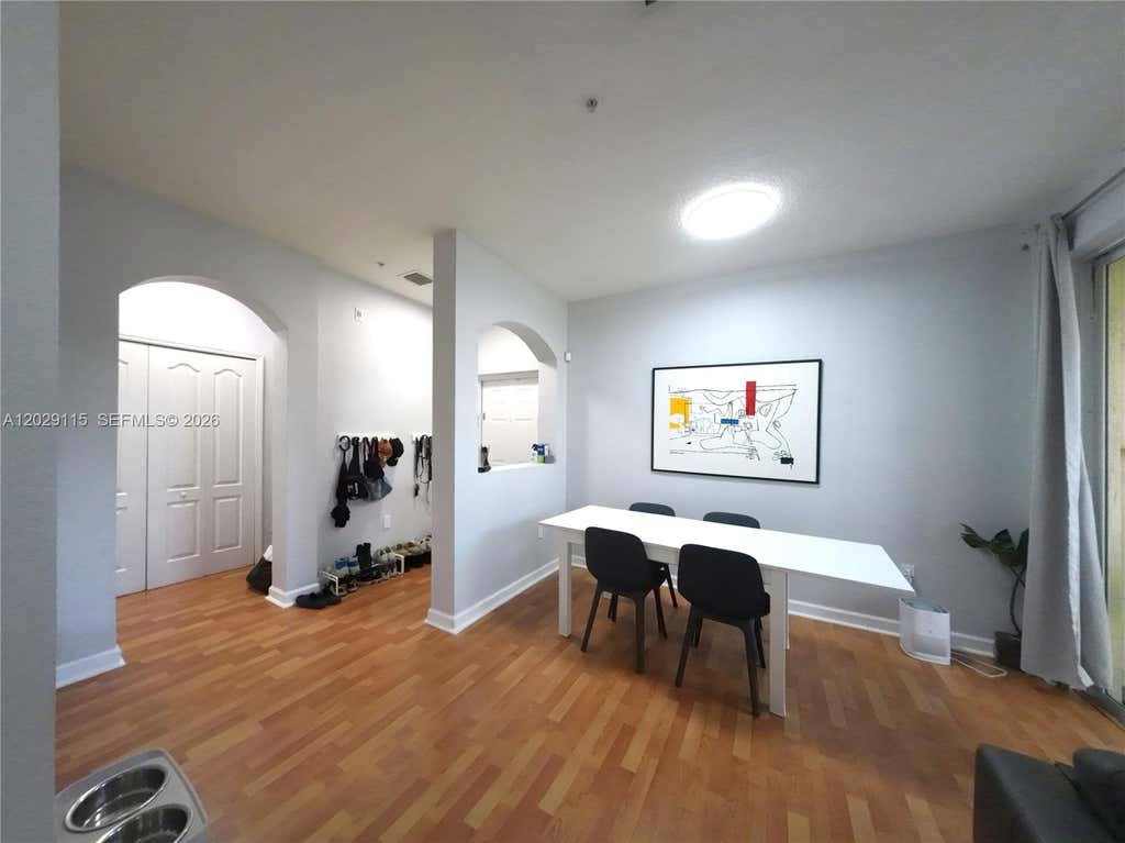 Photo of 130 Jacaranda Country Club Dr #203, Plantation, FL 33324 (MLS # A12029115)