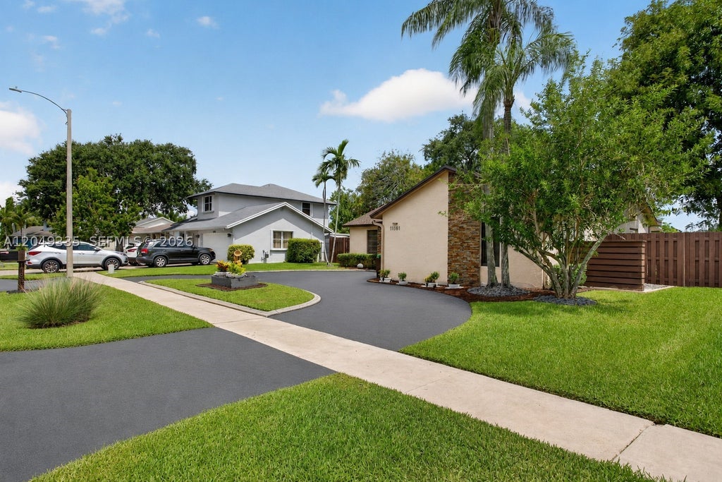 Photo of 11861 NW 41st St, Sunrise, FL 33323 (MLS # A12049335)