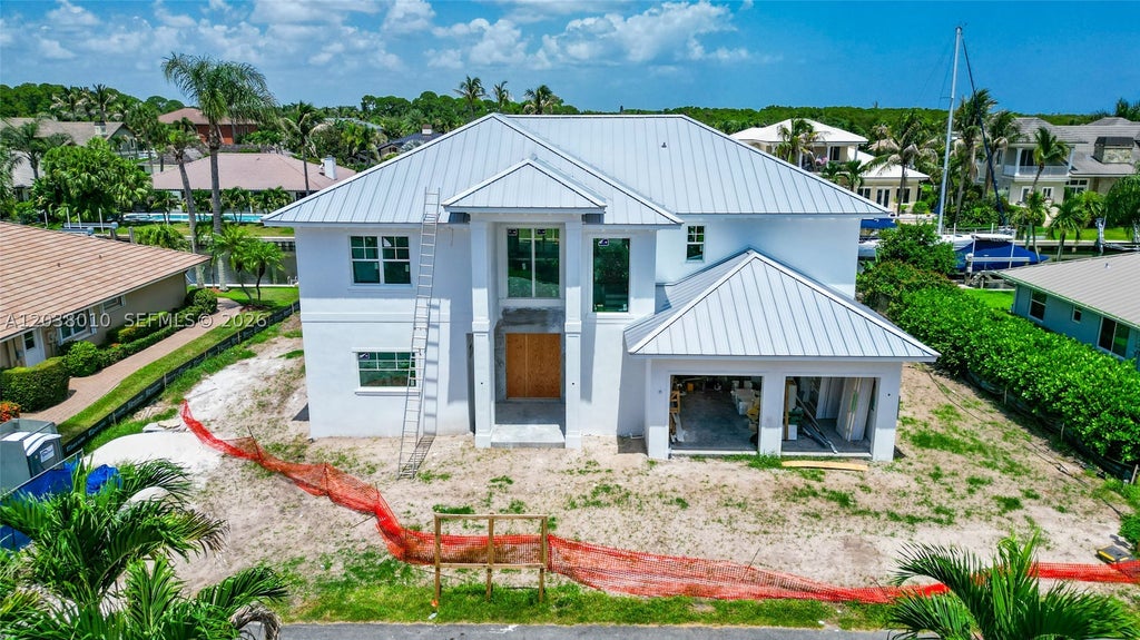 Photo of 8967 SE Star Island Way, Hobe Sound, FL 33455 (MLS # A12038010)