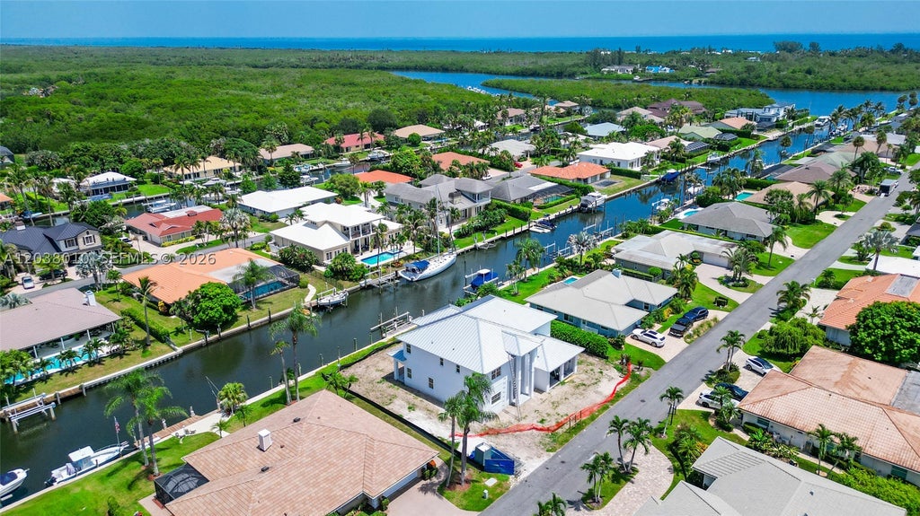 Photo of 8967 SE Star Island Way, Hobe Sound, FL 33455 (MLS # A12038010)