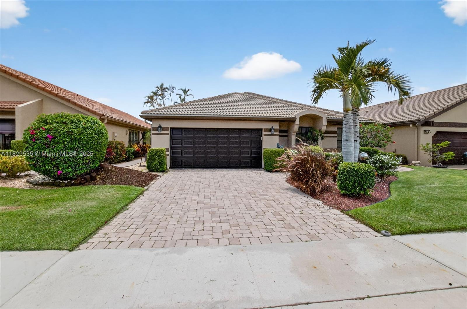 Tucked into an all-age Mandatory Country Club in scenic west Boca Raton. 2/2+ Den offers over 2,000sq ft of thoughtfully designed living space. A spacious, light-filled interior. The flowing design connects the open concept. Perfect for quiet evenings or for hosting. The main bedroom has ample room for a king-size bed & en-suite bath with dual sinks & a tub & a walk-in shower. The second bedroom provides comfortable room for guests. Step out to your private backyard retreat, where a sparkling screen pool with water & golf views. You are a short drive from Boca Raton’s famous beaches; shopping destinations and dining spots abound. For families looking for educational access FAU. Imagine afternoons with friends as the sun sets over the lake, without ever having to leave your neighborhood.